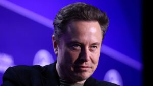 FILE PHOTO: Elon Musk, Chief Executive Officer of SpaceX and Tesla and owner of X looks on during the Milken Conference 2024 Global Conference Sessions at The Beverly Hilton in Beverly Hills, California, U.S., May 6, 2024. REUTERS/David Swanson/File Photo