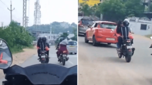 Girl Sits On Man’s Lap, Hugs & Kisses Him As He Rides Bike On Busy Road In Hyderabad; Video Viral