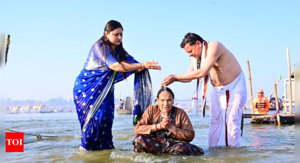 Maha Kumbh: Uttarakhand CM Pushkar Singh Dhami takes holy dip at Triveni Sangam with family