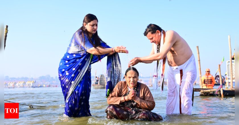 Maha Kumbh: Uttarakhand CM Pushkar Singh Dhami takes holy dip at Triveni Sangam with family