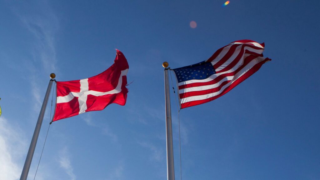 FILE -In this photo taken Nov. 17, 2011, the U.S. and Danish flags fly at the Novozymes new enzyme plant under construction near Blair, Neb. (AP Photo/Nati Harnik, File)